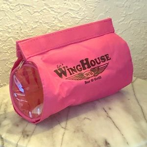 Ker’s Winghouse pink cosmetic bag